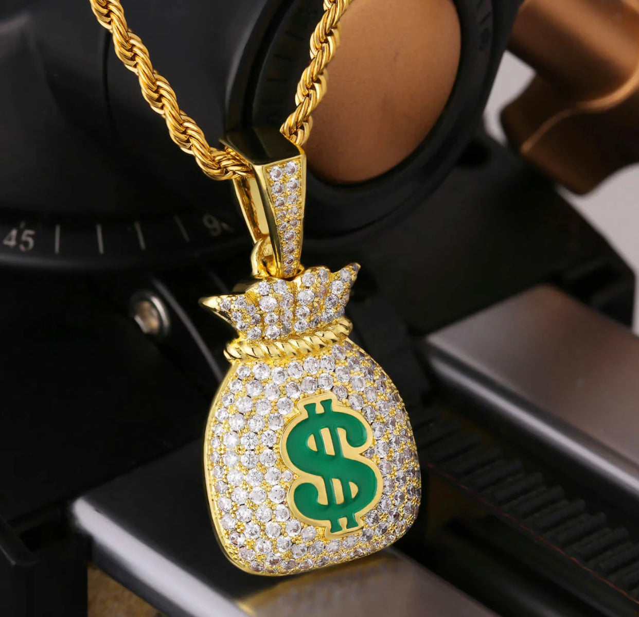 Iced out money store bag pendant